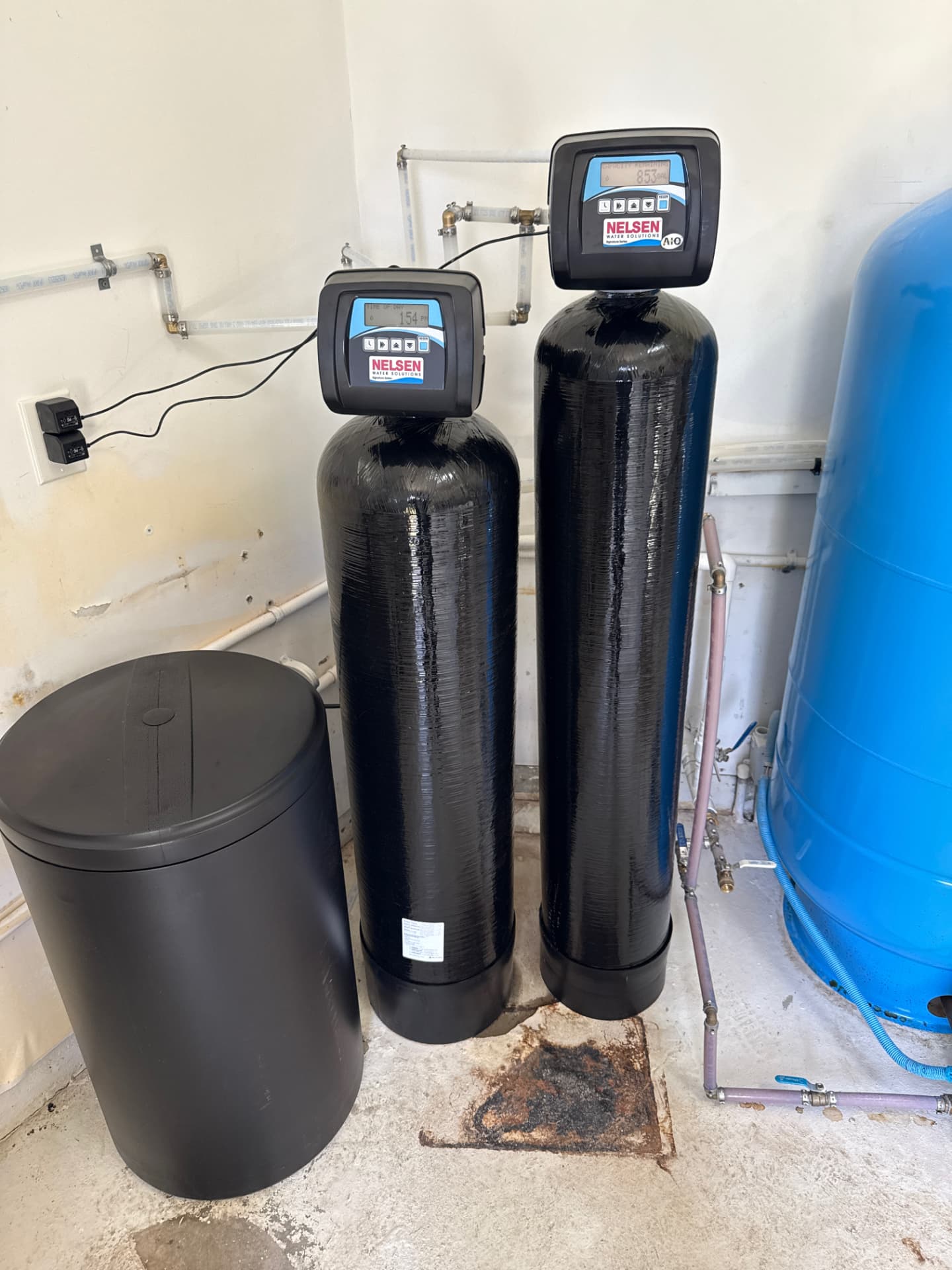 Nelsen water softener and catalytic carbon filtration tanks with brine tank