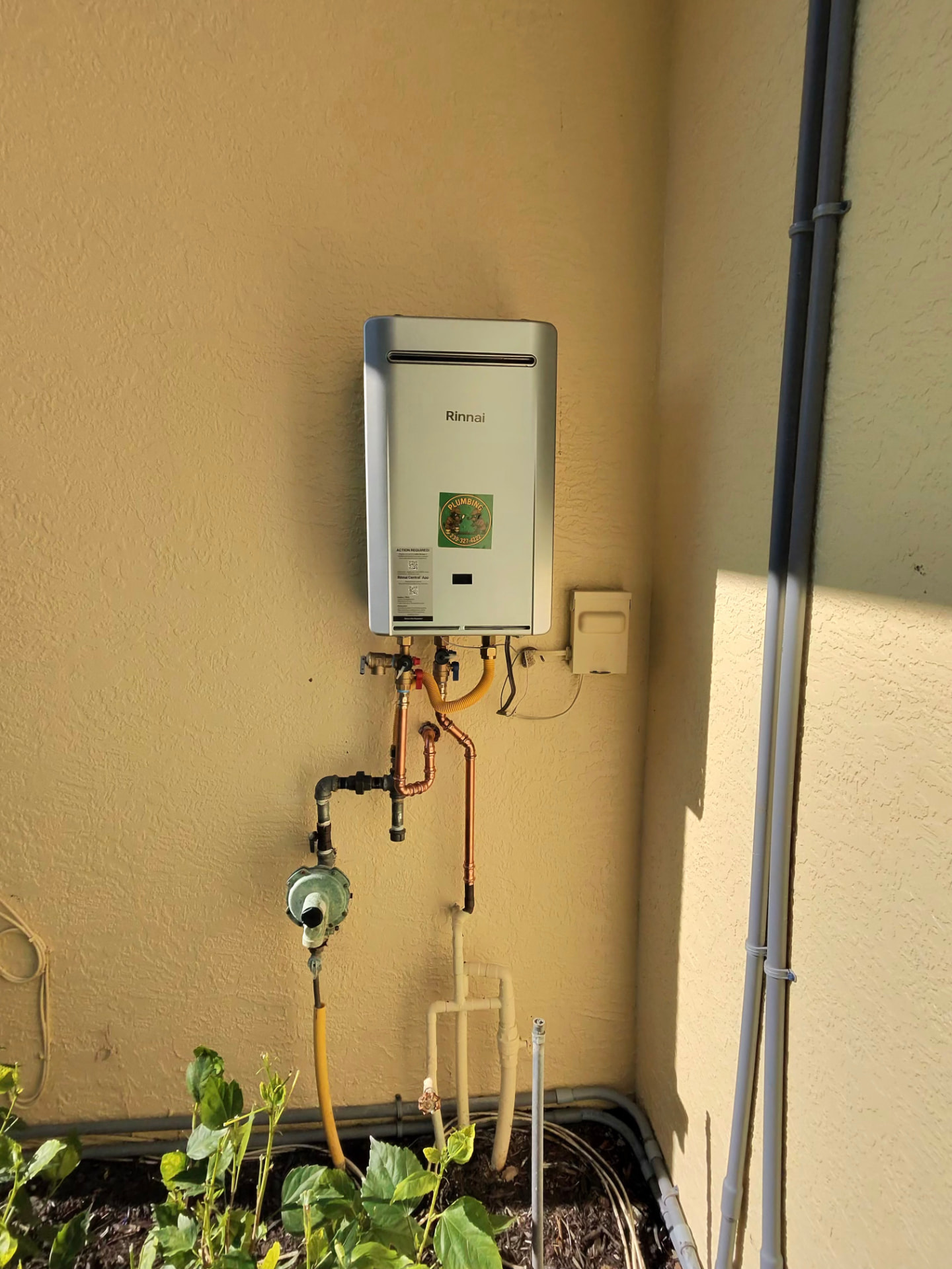 Rinnai tankless water heater installation with gas line and regulator